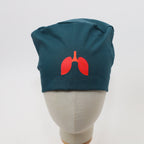 Teal scrub cap back view featuring red lung graphic vinyl transfer design on mannequin head