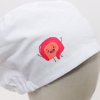 White scrub cap featuring cute pink and orange cartoon intestine character with vinyl transfer