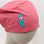 Pink scrub cap back view featuring cartoon medical character vinyl transfer design