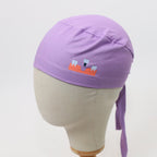 Purple scrub cap with dental implant vinyl design shown in side profile view