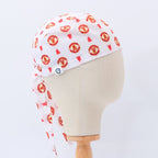Football Club Manchester United White scrub cap pattern detail on mannequin