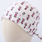 Disney Minnie Mouse scrub cap fabric pattern close-up