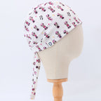 Disney Minnie Mouse scrub cap pattern detail on mannequin