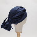 Navy blue bouffant scrub cap by Medicus, reusable with adjustable ties. Perfect for medical professionals. Available in 22 colours.