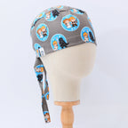 Side view of Star Wars kawaii character pairs scrub cap with tie detail on grey background
