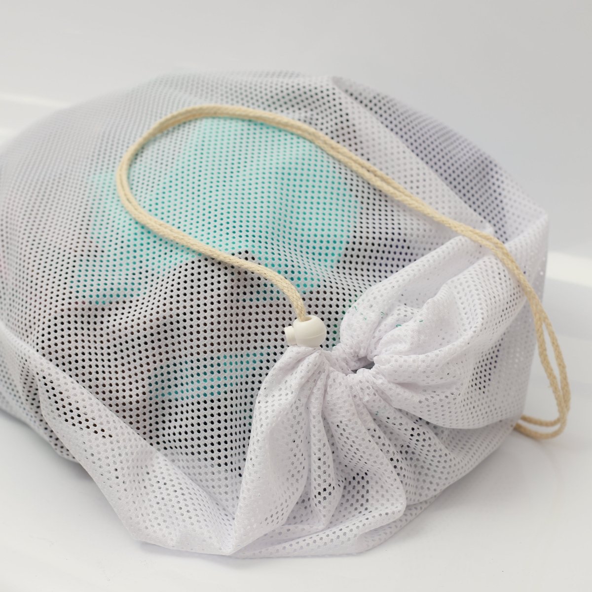 Mesh bag for Medicus Caps' scrub caps.