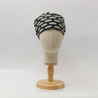 Friends Central Perk scrub cap shown on mannequin head