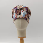 Disney Frozen Crowd scrub cap fabric pattern close-up