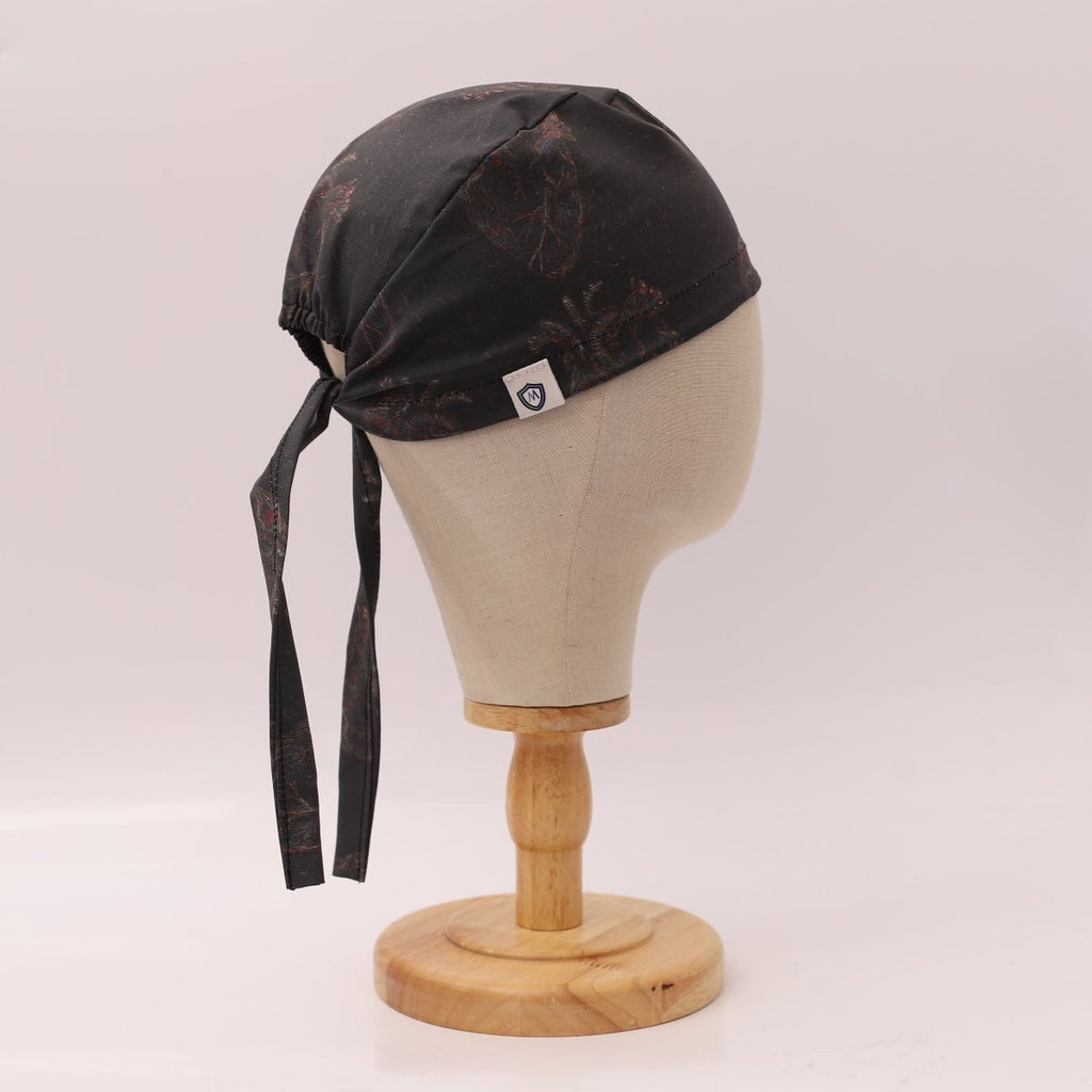 Gorro quirúrgico negro con corazón descolorido