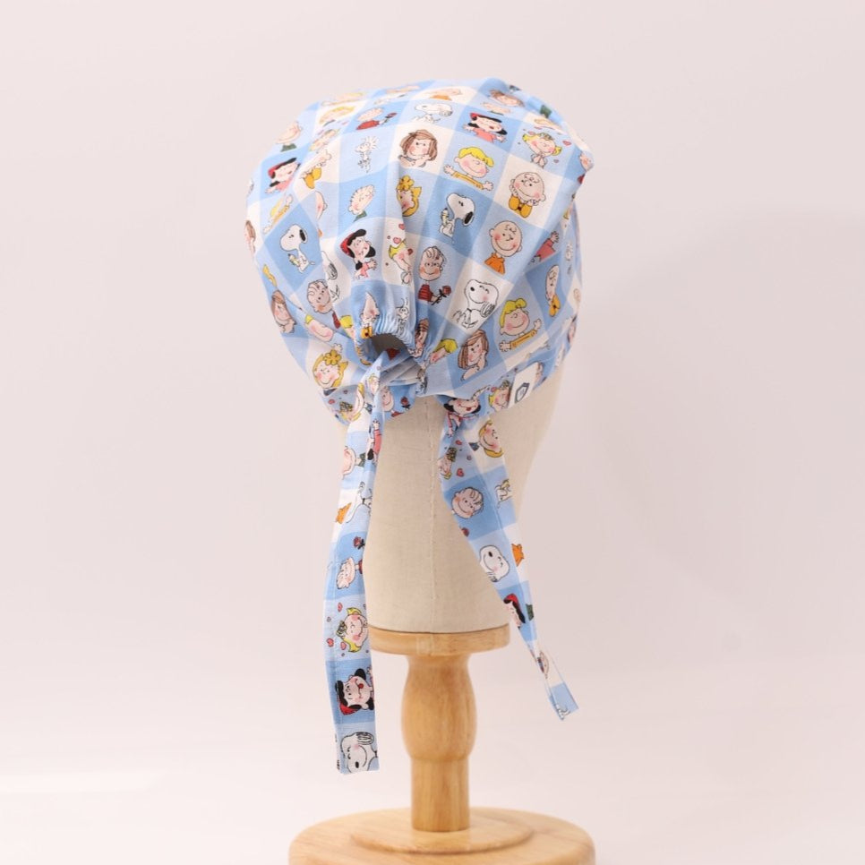 Charlie Brown + Friends In Grid Scrub Cap