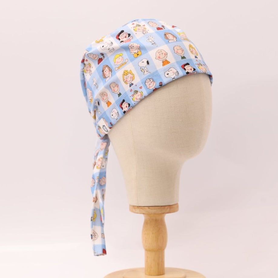 Charlie Brown + Friends In Grid Scrub Cap