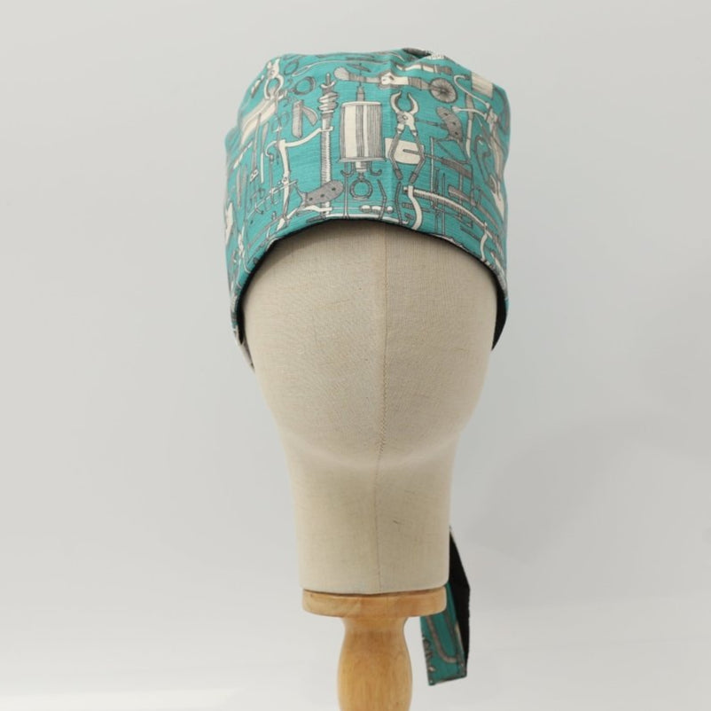 Hospital Tools Surgeons Table On Teal Blue Scrub Cap