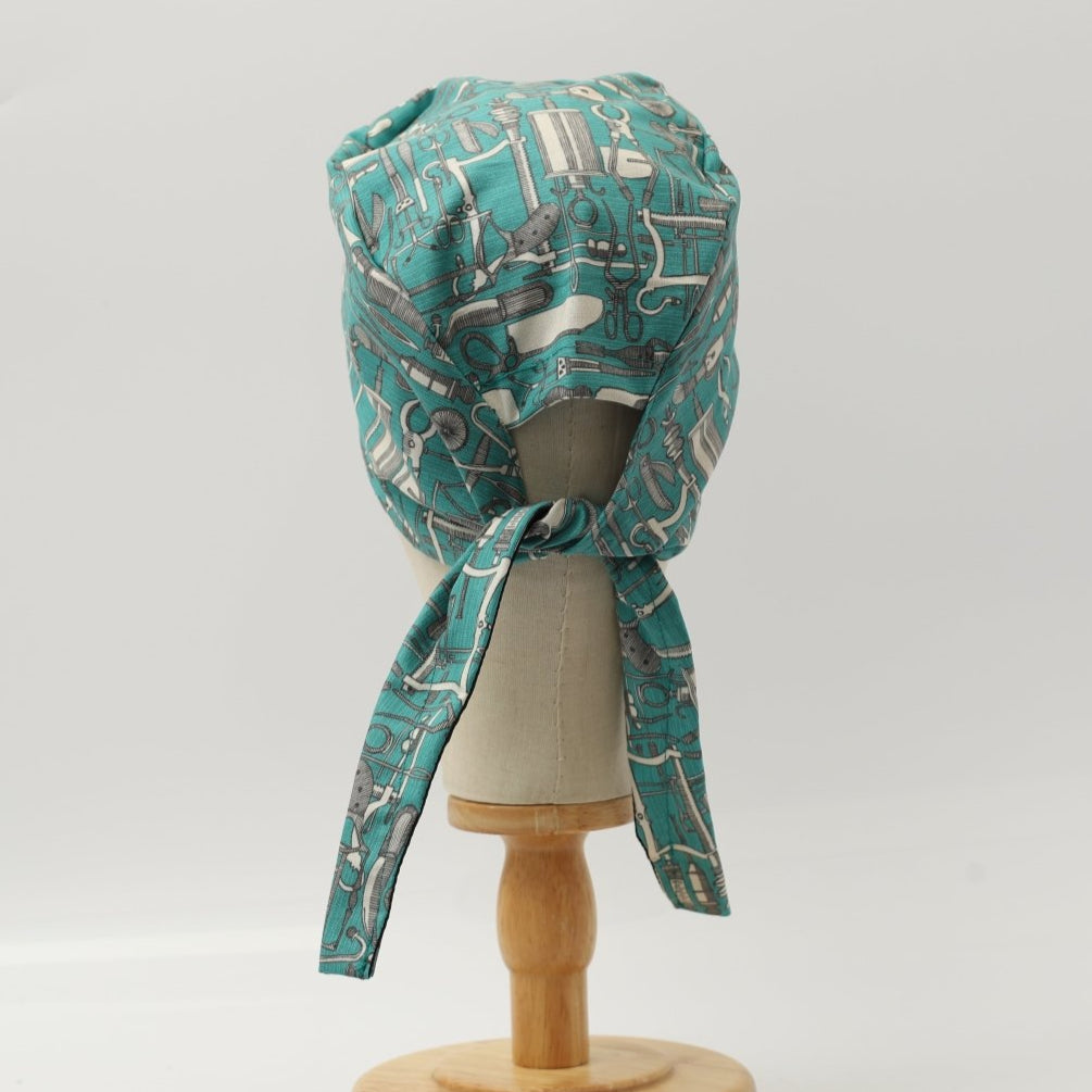 Hospital Tools Surgeons Table On Teal Blue Scrub Cap