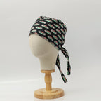 Friends Central Perk scrub cap shown on mannequin head
