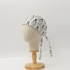 Eye Chart Test scrub cap shown on mannequin head