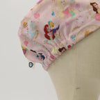 Disney Princesses Mashup Pink scrub cap shown from side angle