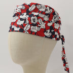 Disney Mickey Mouse On Red scrub cap fabric pattern close-up