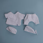 Doll Scrubs + Caps | White doll-sized scrubs with matching Medicus Scrub Caps. Perfect for play or display. @doll-scrubs-caps