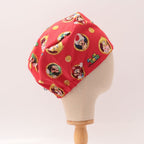 Side profile of red Super Mario scrub cap featuring character portraits and gold coins pattern