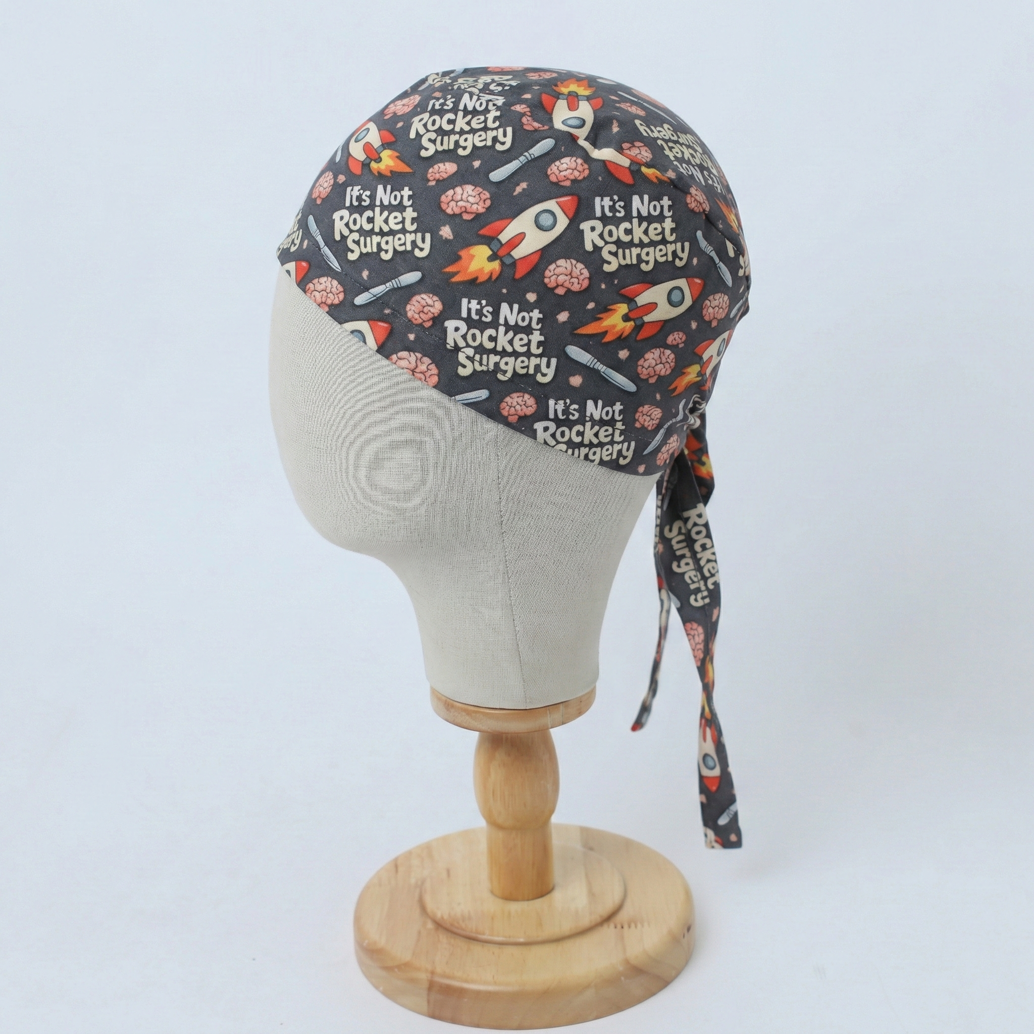 It’s Not Rocket Surgery scrub cap fabric pattern close-up