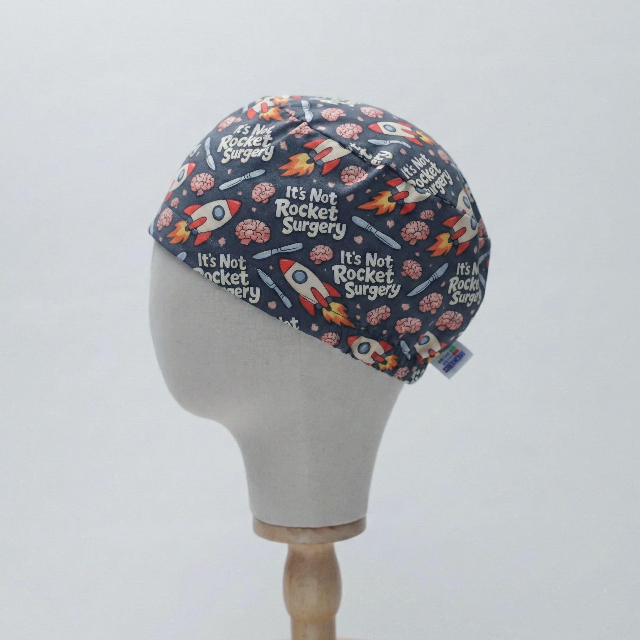 It’s Not Rocket Surgery scrub cap shown from side angle