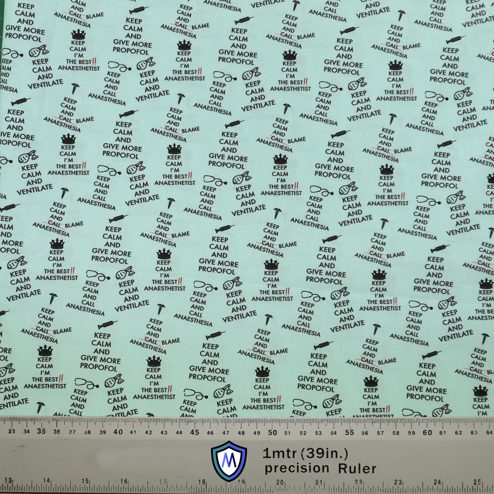 Keep Calm And Blame Anaesthesia scrub cap fabric from Medicus Scrub Caps, featuring anesthesia-themed text and symbols on a light blue background.