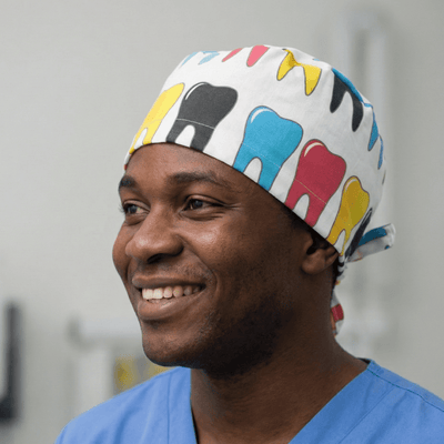 Large Colourful Teeth scrub cap shown on model