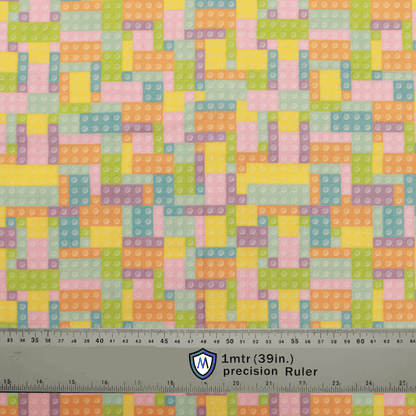 Fabric sample with pastel-colored LEGO and Tetris-inspired pattern, designed for Medicus Scrub Caps. A 1-meter ruler at the bottom provides scale.