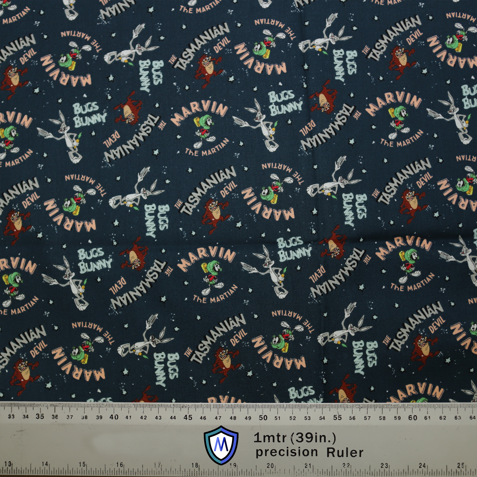 The Looney Tunes Scrub Cap by Medicus Scrub Caps features Bugs Bunny, Tasmanian Devil, and Marvin the Martian on a dark space-themed background, ensuring comfort and style.