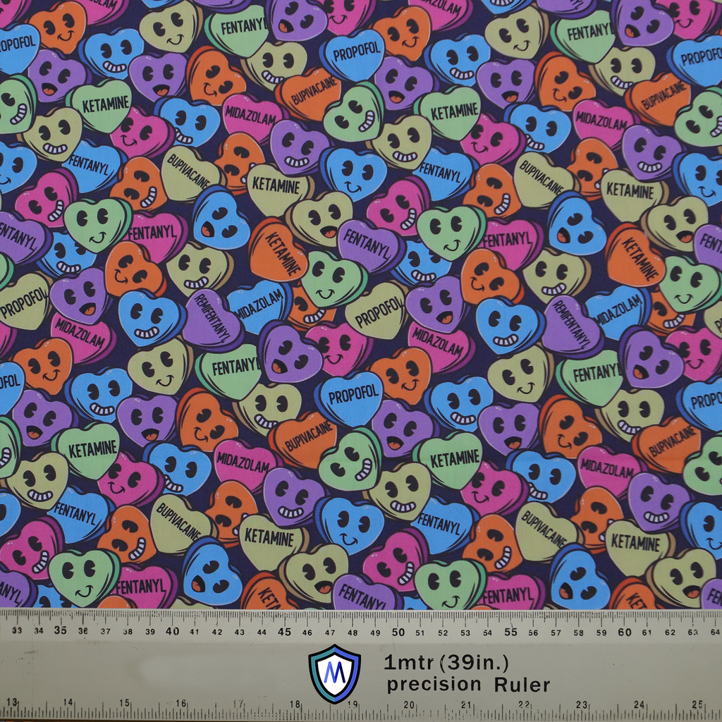 Love Drug Candy Scrub Cap from Medicus Scrub Caps, featuring colorful heart-shaped candies with anesthetic drug names and playful facial expressions.