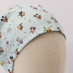 Disney Mickey Mouse + Friends Blue Grey Stars scrub cap pattern detail on mannequin