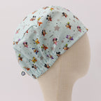 Disney Mickey Mouse + Friends Blue Grey Stars scrub cap fabric pattern close-up