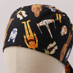 Close-up detail of black Star Wars scrub cap showing colorful character pattern including droids and spaceships