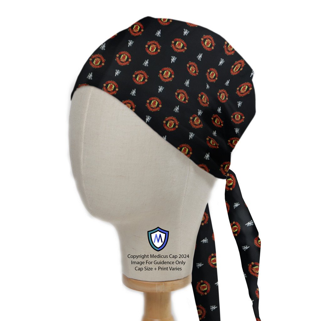 The Football Club Manchester United Black Scrub Cap by Medicus Scrub Caps, featuring a long tail and team logo pattern, displayed on a mannequin.