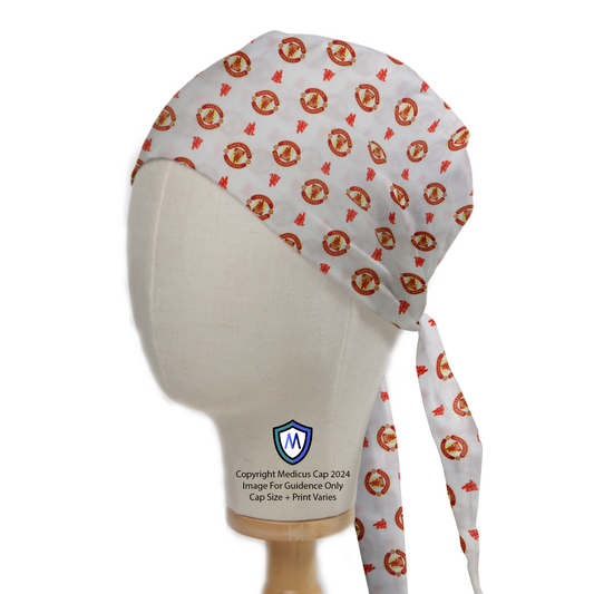 Football Club Manchester United White Scrub Cap from Medicus Scrub Caps, featuring a repeating pattern of the club’s logo on a white background.