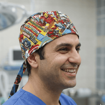 Marvel Comic Book Covers Vintage Hulk Iron Man Spiderman scrub cap shown on model