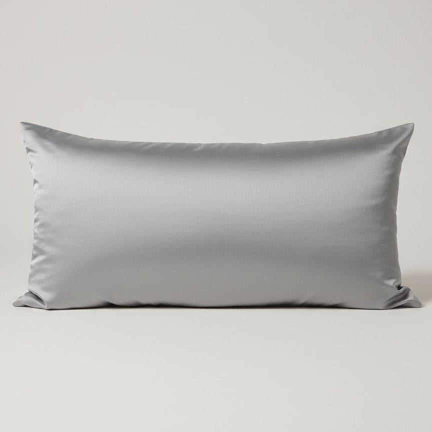 Silver gray satin pillowcase displayed on a light gray background, showing smooth silky fabric texture