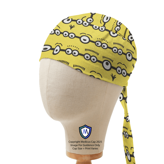 Yellow scrub cap with a Minions eyes pattern by Medicus Caps, displayed on a mannequin, showcasing its playful and fun design.