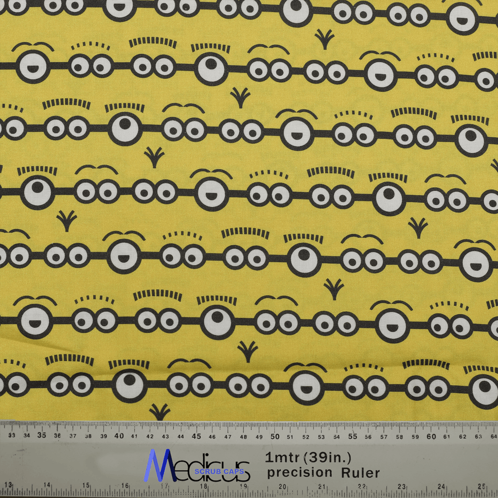 Fabric pattern with Minions eyes on a yellow background by Medicus Caps, designed for fun and playful scrub caps.