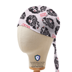 Side profile view of Music Kiss Band scrub cap with black band faces on light gray fabric