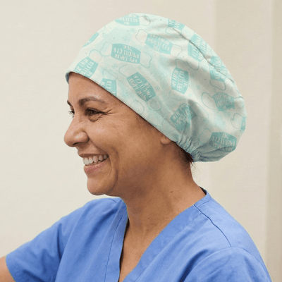 Mint green text pattern reusable scrub cap with elastic band for healthcare workers