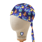 Side view of Pokemon In Space Blue scrub cap showing colorful Pokemon characters on purple starry background