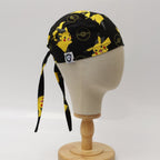 Pokemon Pikachu yellow character pattern on black scrub cap displayed on mannequin head side view
