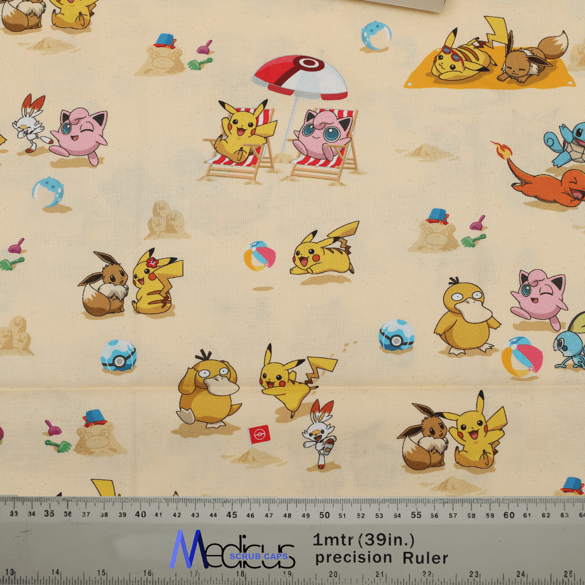 Medicus Scrub Caps' "Pokemon Summer Pikachu" scrub cap fabric featuring Pikachu, Eevee, Jigglypuff, and more enjoying a beach day with umbrellas and beach balls.