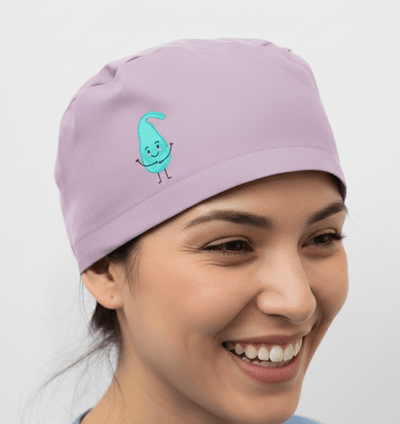 Purple scrub cap with turquoise cartoon character design shown in side profile view