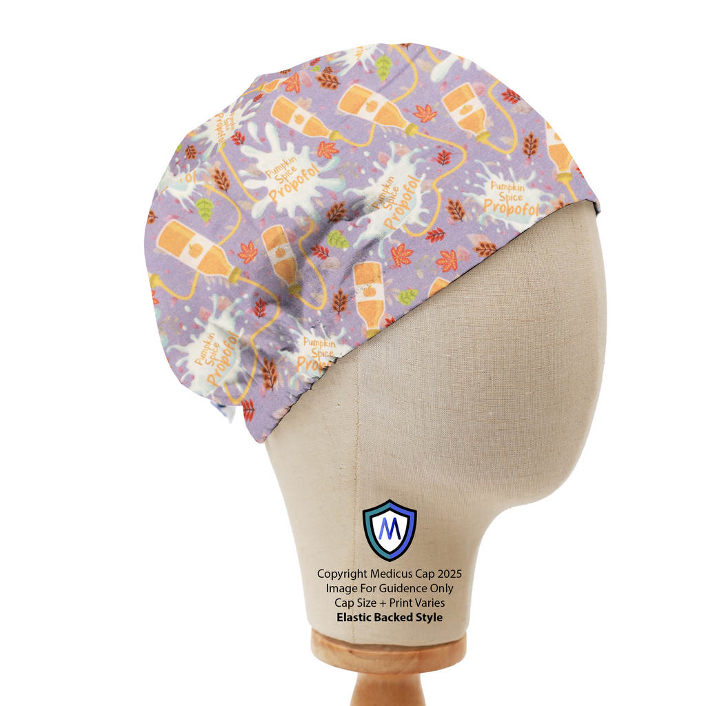 Medicus Scrub Cap with a pumpkin spice propofol-themed pattern on a lavender background, featuring autumn leaves and propofol vials. Elastic-backed style.