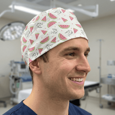Watermelon slice pattern scrub cap with pink fruit print on white background