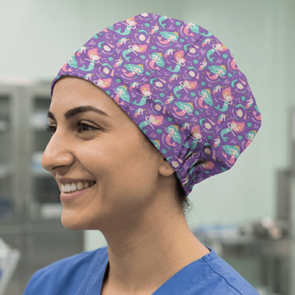 Purple mermaid pattern scrub cap with colourful sea creatures and shells design