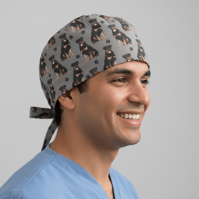 Grey scrub cap with black tan Rottweiler dog pattern and paw prints tie-back design