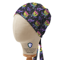 Scooby-Doo purple scrub cap by Medicus on mannequin featuring vibrant cartoon print.